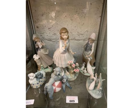 Collection of Nao figurines of girls &amp; animals, condition requests and additional images will not be given for lots in th