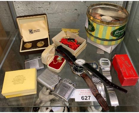 Shelf of items to include watches, cufflinks, lighters, coins etc condition requests and additional images will not be given 