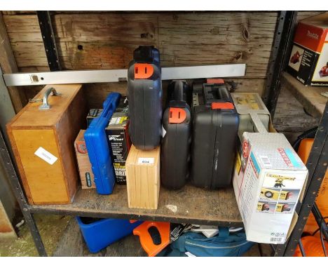 Shelf of power tools to include hammer drills, laser spirit level, Black &amp; Decker 25 piece drill set etc, condition reque