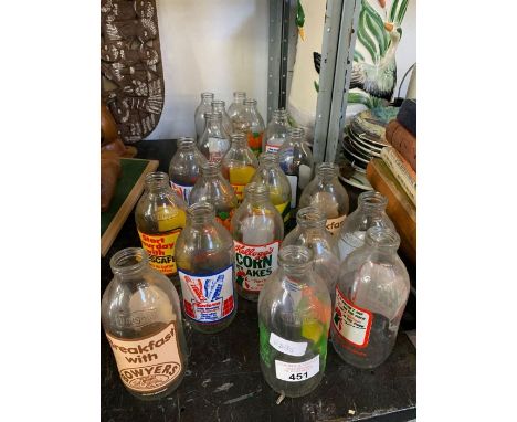 Half shelf of Unigate milk bottles, condition requests and additional images will not be given for lots in this sale.