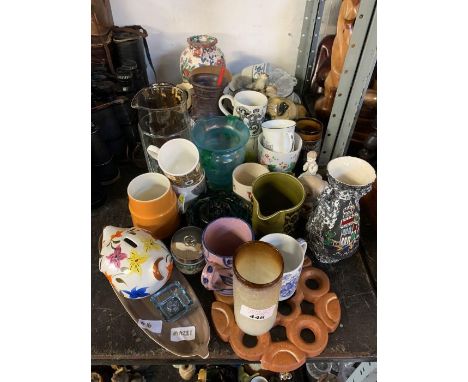 Half shelf of cups, dishes, vases etc condition requests and additional images will not be given for lots in this sale.