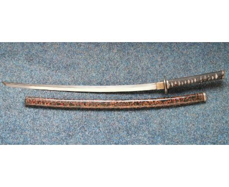A Japanese Samurai sword, tsuba with raised koi carp decoration, with lacquered scabbard, length of blade 68cm, shagreen hand