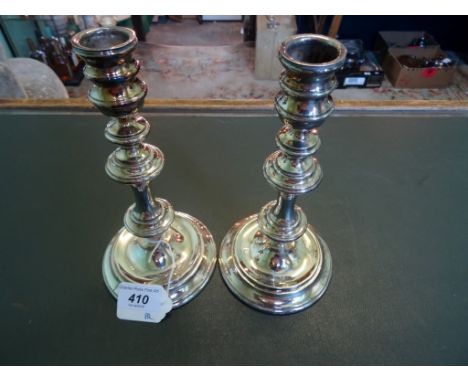A pair of late 20th century silver candlesticks, of ringed form, Sheffield hallmarks 1978 (21.5cm).
