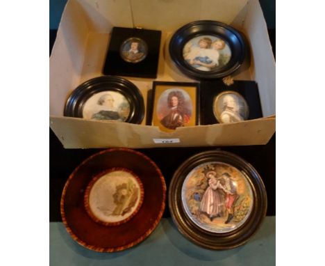 A wooden framed pot lid, together with a quantity of portrait miniature frames, each containing reproduction prints.