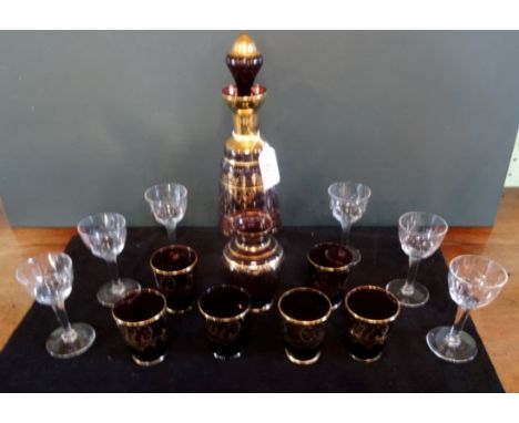 A mid-20th century Venetian glass decanter set, comprising: decanter, six glasses and a small vase, together with a set of si