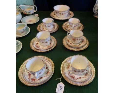 A 1920's Shore & Coggins part-tea service, a six place setting, comprising: trios, a large open sugar bowl and a circular pla