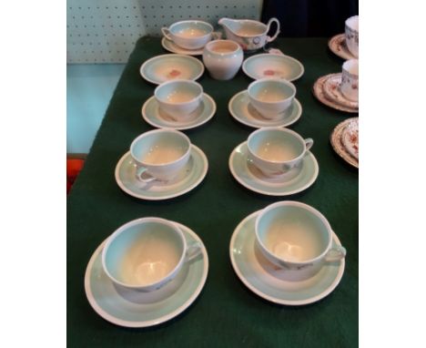 A quantity of mid-20th century Susie Cooper teawares, comprising: six cups and saucers, sugar bowl and other items.