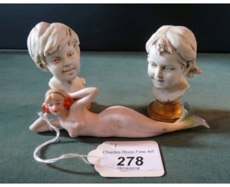 A pair of ceramic busts of a boy and girl, each signed Benacchio, mounted on gilt circular plinth (7.5cm), together with a ha