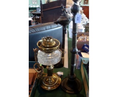 A brass and clear glass oil lamp, later converted to electricity, together with an Eastern metalware incense burner.