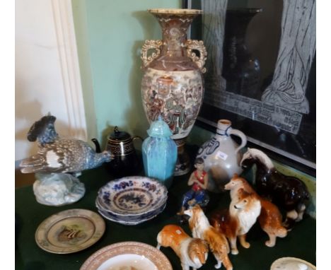 A large mixed lot, comprising: ceramic animals, a large twin handled Japanese vase, a Continental model of a turkey and other