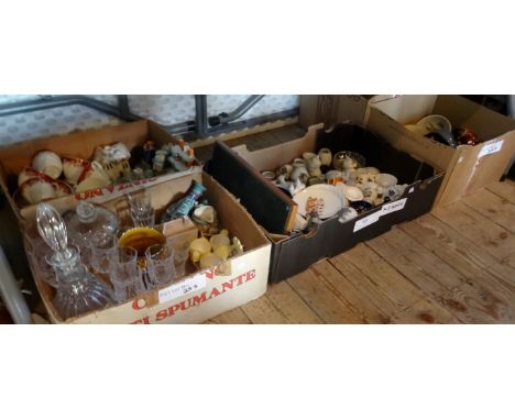 Five boxes containing a large quantity of decorative ceramics and glass, to include: crested china, animal figurines, decante