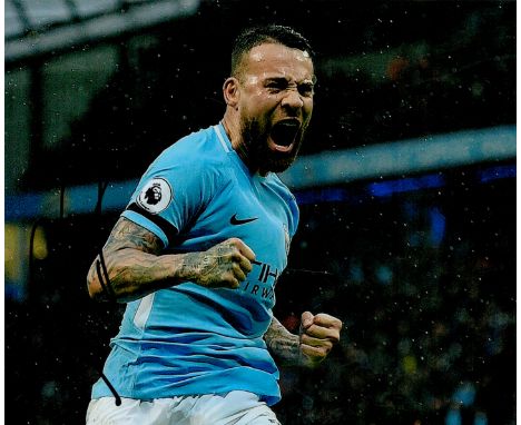 Football Nicolás Otamendi signed 10x8 inches colour photo pictured while playing for Manchester City. Good condition. All aut