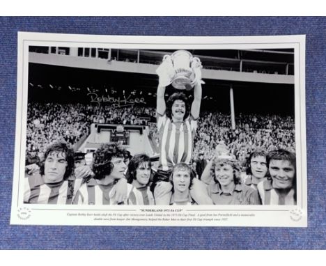 Bobby Kerr signed 16x12 Sunderland 1973 FA Cup black and white print. Captain Bobby Kerr holds aloft the FA Cup after victory