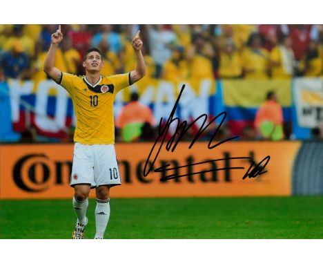 Football James Rodríguez signed 12x8 inches colour photo pictured whole playing for Colombia. Good condition. All autographs 