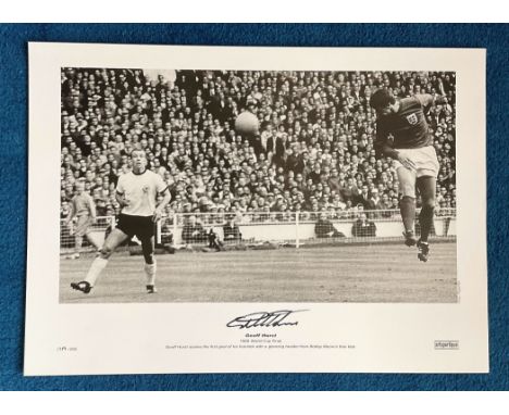 Geoff Hurst signed 22x16 black and white 1966 World Cup Final black and white print Geoff Hurst scores the first goal of his 