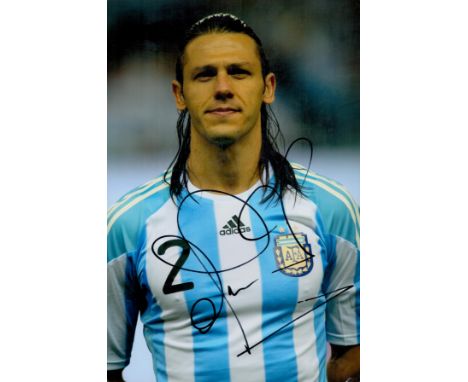 Football Martín Demichelis signed 12x8 inches colour photo pictured while playing for Argentina. Good condition. All autograp