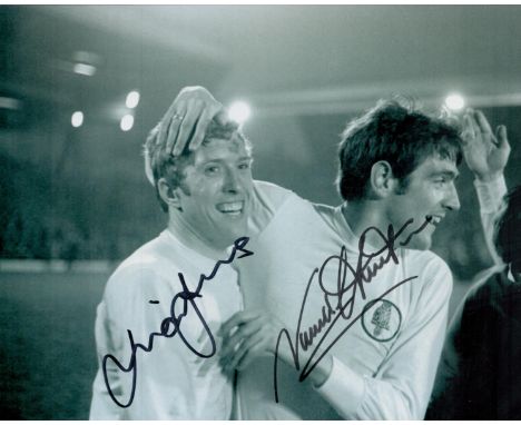 Football Mick Jones and Norman Hunter signed 10x8 inches black and white Leeds United vintage photo. Good condition. All auto