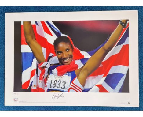 Denise Lewis signed 22x16 colour Team GB Olympic Gold Big Blue Tube print. Olympic Games Sydney 2000Denise Lewis shows the tr