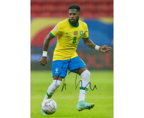 Football Fred signed 12x8 inches colour photo pictured playing for Brazil. Good condition. All autographs are genuine hand si