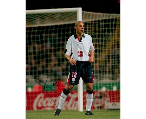 Football Rio Ferdinand signed 10x8 inches colour photo pictured while playing for England. Good condition. All autographs are