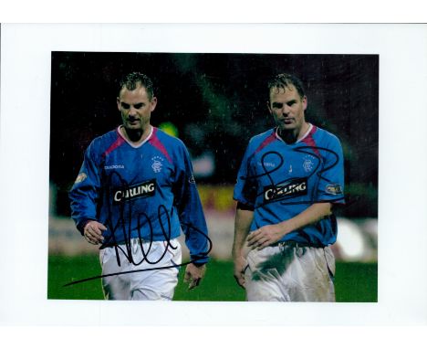 Football. Ronald and Frank de Boer Signed 12 x 8 inch Colour Photo Showing the Pair Playing for Rangers. Good condition. All 