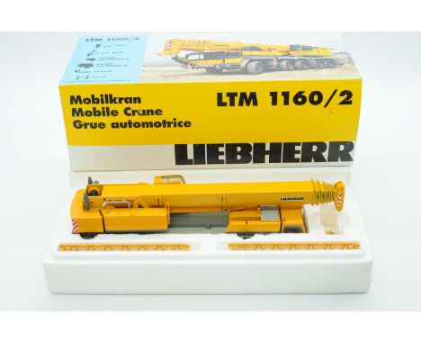 Conrad a boxed 1:50 Scale No.2090 LTM1160/2 Mobile Crane "LIEBHERR". Condition is generally Good with some parts having surfa