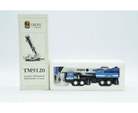 NZG a boxed 1:50 Scale No.380 TM9120 Carrier-Mounted Hydraulic Crane "STEFFY CRANES". Condition is generally Excellent in gen