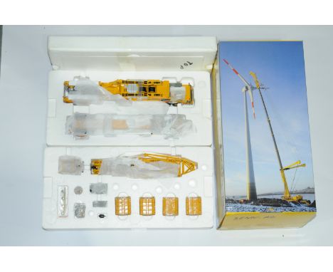 NZG a boxed 1:50 Scale No.732/09 LTM11200-9.1 Mobile Crane "SENN-AG". Condition is Near Mint (unchecked for completeness) in 