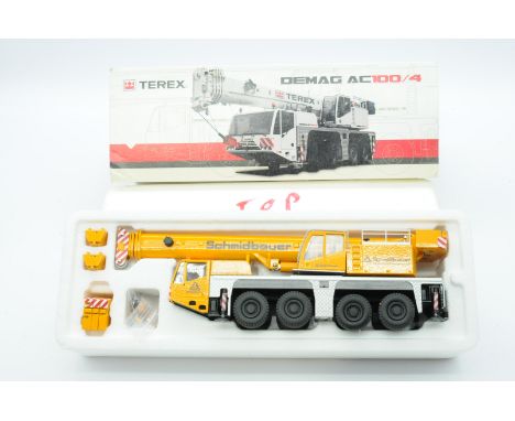 Conrad a boxed 1:50 Scale No.2104/0 Demag AC100/4 All-Terrain Crane "SCHMIDBAUER". Condition is Excellent Plus to Near Mint (