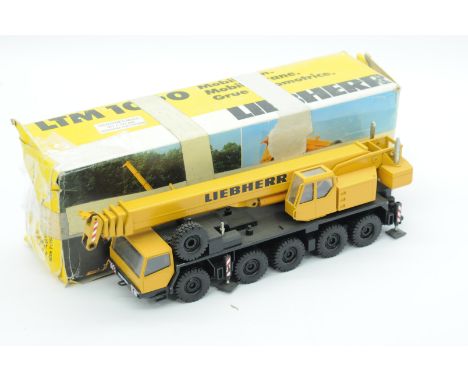 Conrad a boxed 1:50 Scale No.2085 LTM1090 Mobile Crane "LIEBHERR". Condition is Excellent (unchecked for completeness) in Poo