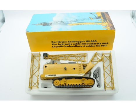 Conrad a boxed 1:50 Scale No.2831 HS883 Hydraulic Cable Excavator "LIEBHERR". Condition is Good to Excellent (unchecked for c