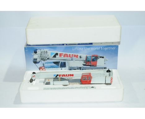 Conrad a boxed 1:50 Scale No.2096 ATF 100-5 All-Terrain Crane "TADANO-FAUN". Condition is Excellent (unchecked for completene