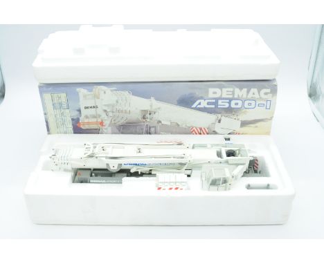 Conrad a boxed 1:50 Scale No.2095/0 Demag AC500-1 Telescopic Crane. Condition is generally Good (unchecked for completeness a