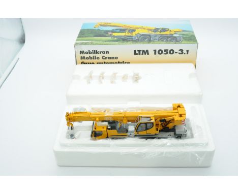 WSI a boxed 1:50 Scale No.9478 LTM1050-3.1 Mobile Crane. Condition is Excellent Plus (unchecked for completeness) in Fair to 