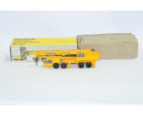 NZG a boxed 1:50 Scale No.240 Demag HC130 Telescopic Truck Crane. Condition is Excellent (unchecked for completeness and woul