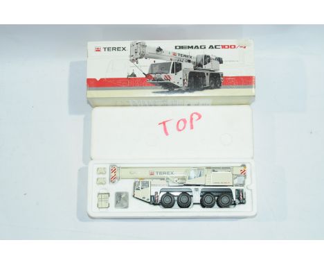 Conrad a boxed 1:50 Scale No.2104/0 Demag AC100/4 "TEREX". Condition is Excellent Plus to Near Mint (unchecked for completene