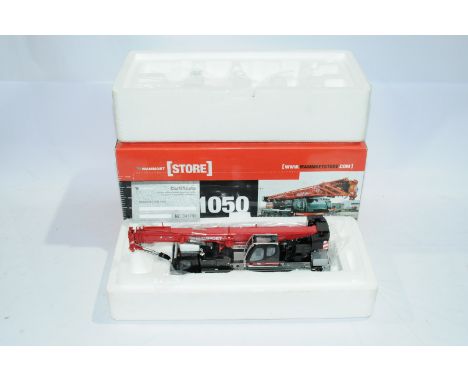 WSi a boxed 1:50 Scale No.410023 LTM1050 Crane "MAMMOET". Condition is Near Mint (unchecked for completeness) in generally Go