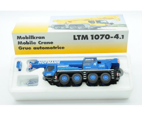 Conrad a boxed 1:50 Scale No.2100 LTM1070-4.1 Mobile Crane "HOFMANN". Condition is Excellent Plus to Near Mint (unchecked for