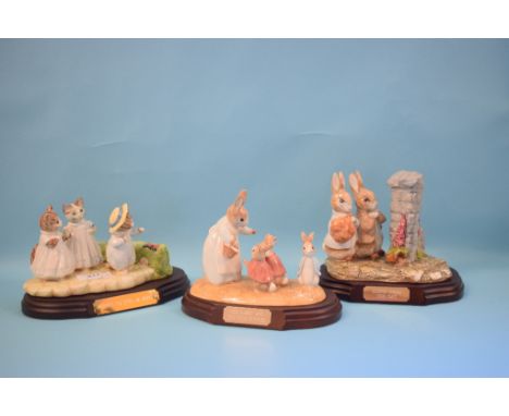 A Beswick Beatrix Potter tableau, Mrs Rabbit and the Four Bunnies, 1933/1997, BP-8b, with certificate, and two others, Mitten