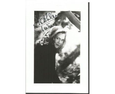 Kathleen Turner signed small b/w photo. American film and stage actress and director. Known for her distinctive raspy voice, 