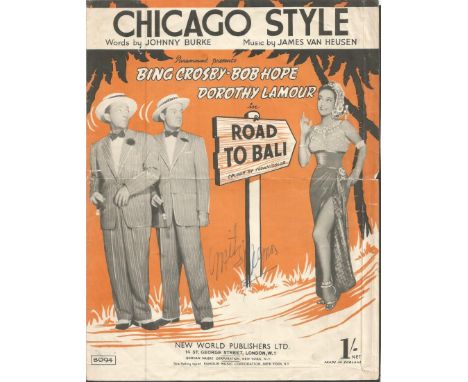 Unidentified signed collection. Consists of vintage Chicago signed programme and 2 photos one James Bond Girl & one other. Go