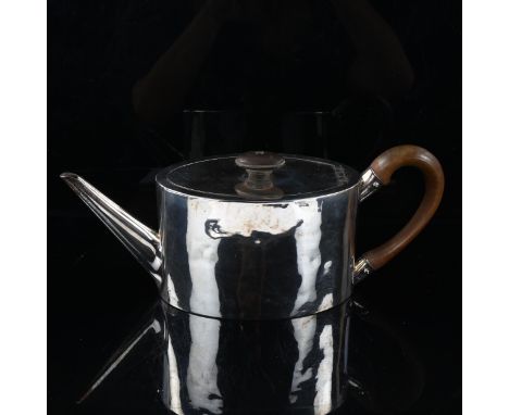 A George III silver oval teapot, by Andrew Fogelberg and Stephen Gilbert, hallmarks London 1786, height 11cm, 13.2oz 