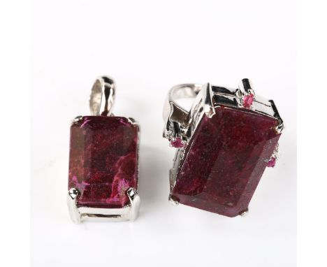 A modern silver and ruby matching ring and pendant set, ring setting height 30.1mm, size Q, pendant height 37.2mm, 31.5g tota