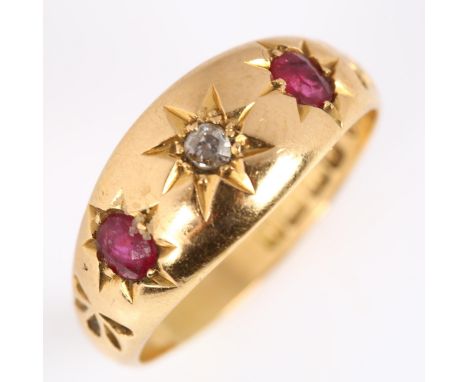 An early 20th century 18ct gold three stone ruby and diamond gypsy ring, set with oval mixed-cut ruby and old-cut diamond, ha