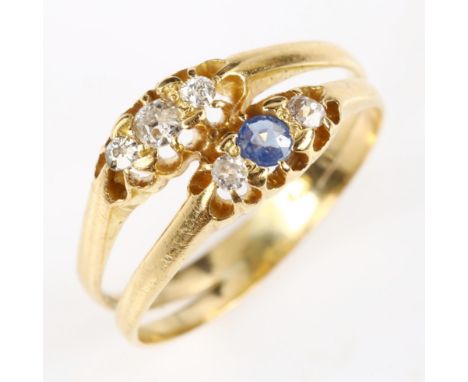 An early 20th century 18ct gold conjoined ring, set with sapphire and diamond, setting height 8.1mm, size K, 2.8g 