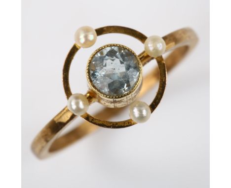 An Edwardian blue topaz and pearl dress ring, unmarked gold settings, 11.1mm, size K/L, 1.9g 