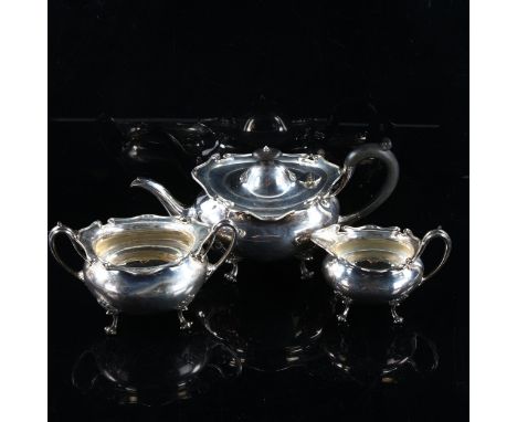 An Edwardian Scottish silver 3-piece tea set, comprising teapot, 2-handled sugar bowl and cream jug, oval bulbous form with s