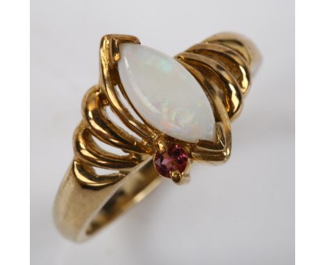 A modern 9ct gold opal and pink tourmaline dress ring, setting height 12.3mm, size N, 3.8g 