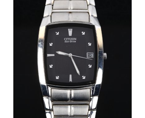 CITIZEN - a stainless steel Eco-Drive quartz bracelet watch, ref. E111-3049385, black dial with steel hour markers, sweep cen