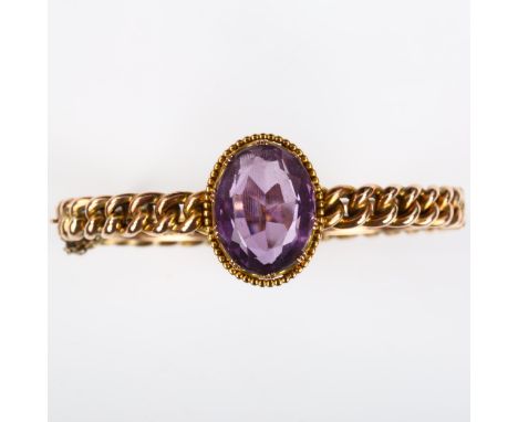 A Victorian amethyst curb link hinged bangle, unmarked rose gold settings with oval mixed-cut amethyst, setting height 21.5mm